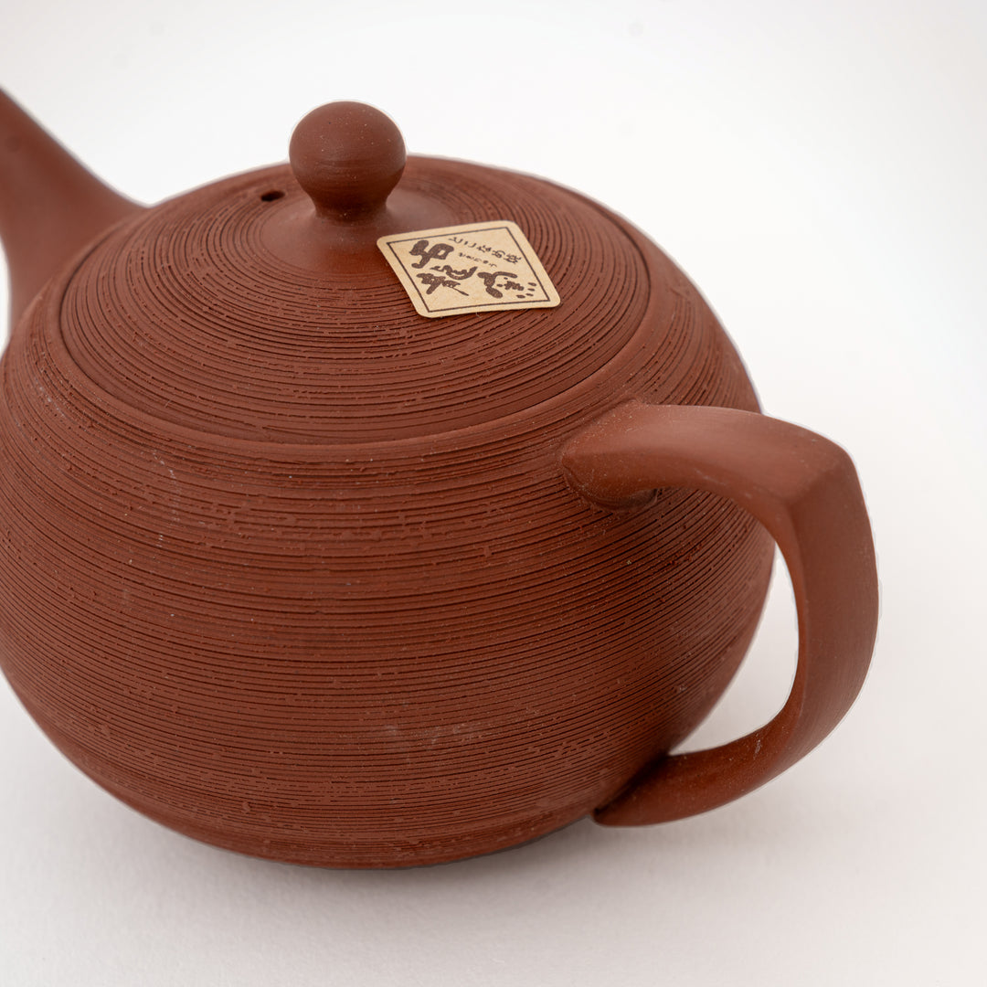 Sekiryu Tōen red clay teapot with textured pine bark finish