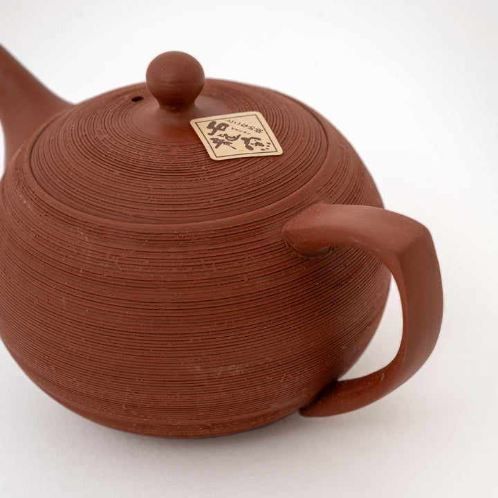 Sekiryu Tōen red clay teapot with textured pine bark finish