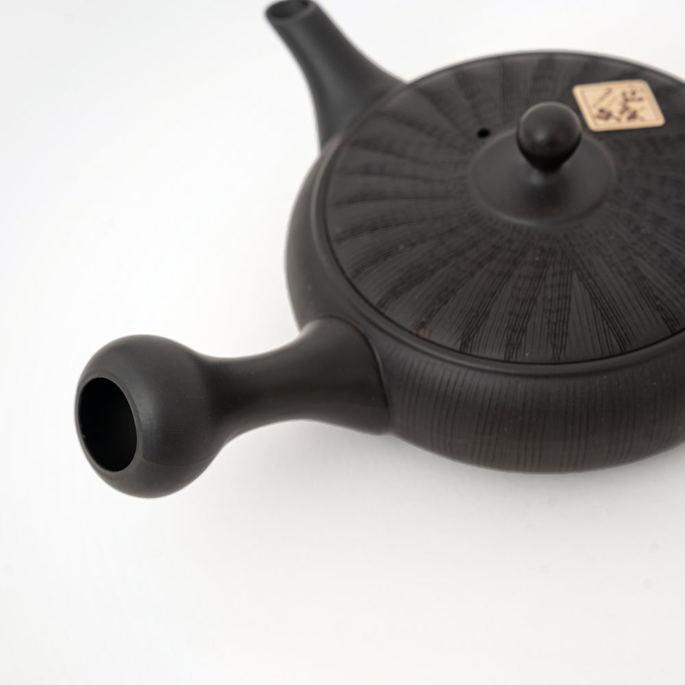 Japanese Tokoname pottery teapot with radiating textured surface