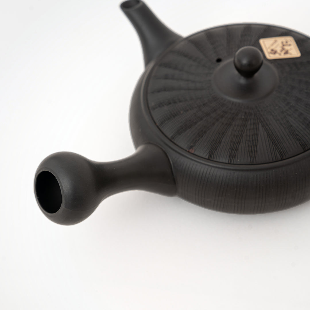 Japanese Tokoname pottery teapot with radiating textured surface