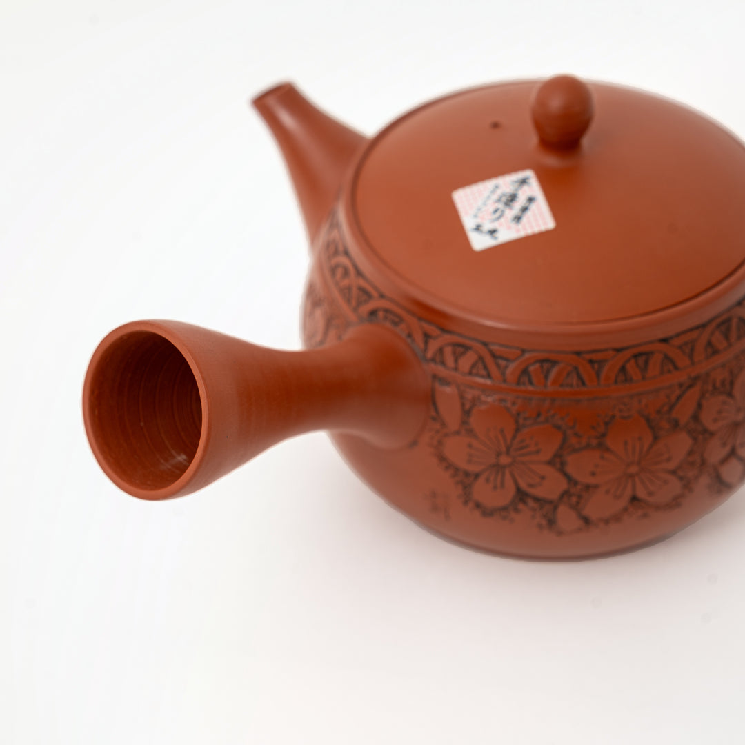 Floral design on Japanese shudei red clay side-handle teapot