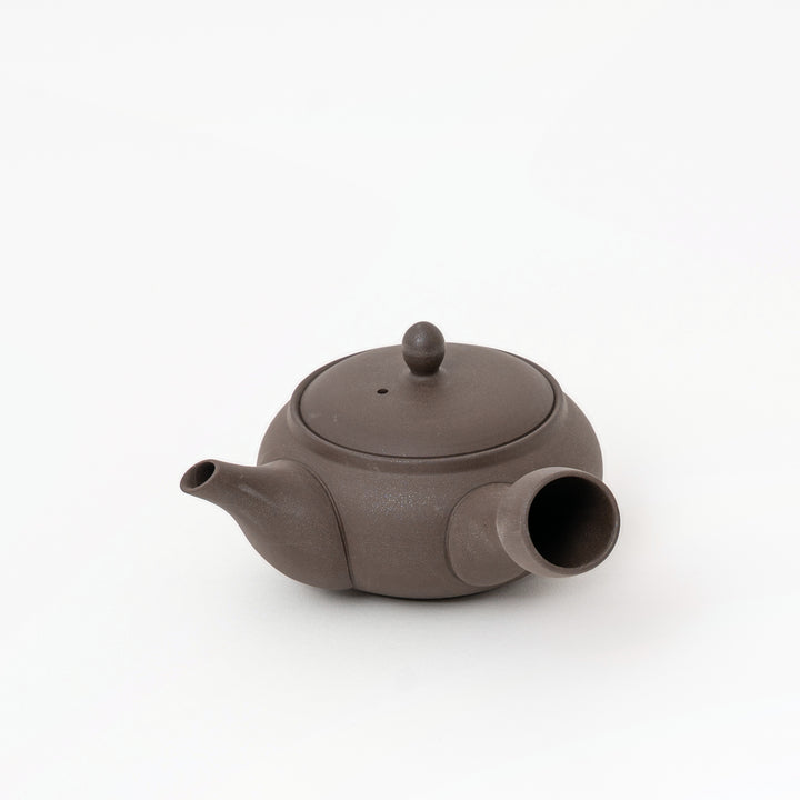 Brown Japanese pottery kyusu teapot with rounded body and side handle