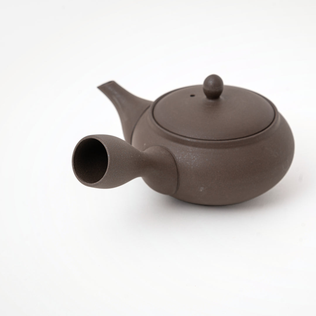 Traditional Japanese side-handle brown pottery teapot with fitted lid
