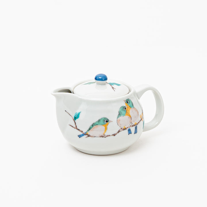 Authentic Kutani ware ceramic teapot with hand-painted birds on branch

Japanese kyusu tea pot with blue knob and bird design