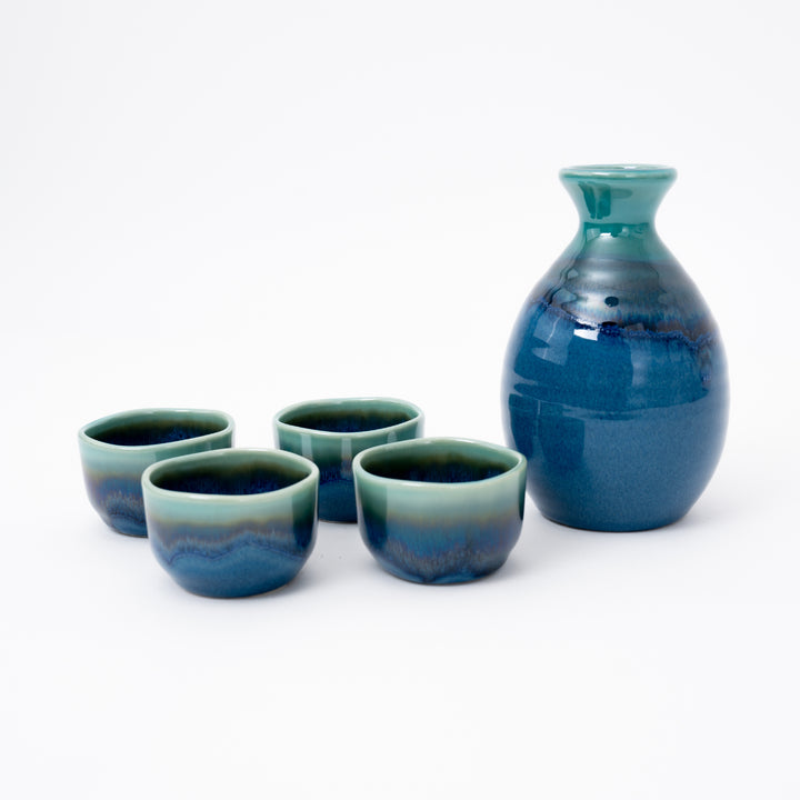 Handmade Japanese Mino ware ocean blue sake set with one sake bottle and four matching cups