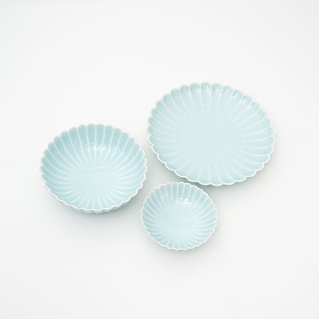 Hasami ware bowl showing blue glazed chrysanthemum pattern