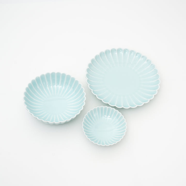 Hasami ware bowl showing blue glazed chrysanthemum pattern