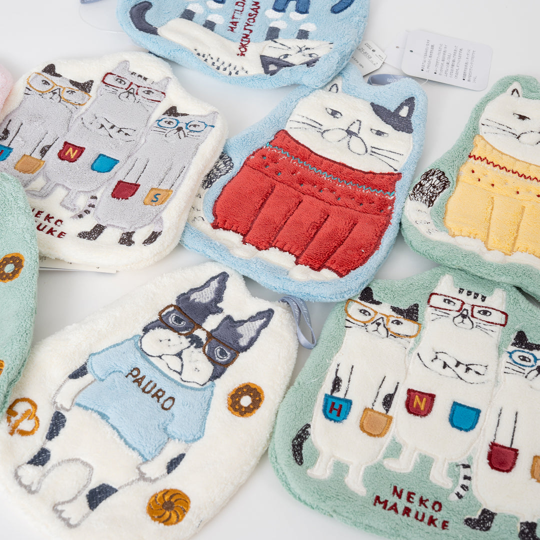 Kusuguru Japan plush character hand towels with embroidered cat and dog designs and hanging loops