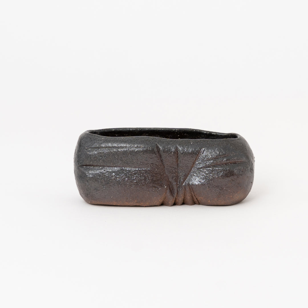 Japanese long oval wildflower vessel with rustic dark wabi-sabi glaze