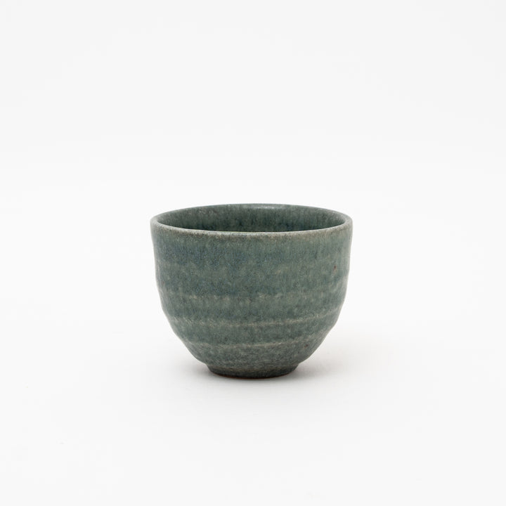 Handmade Japanese Shigaraki Ware Black Celadon ceramic teacup (yunomi) with textured, ribbed glaze
