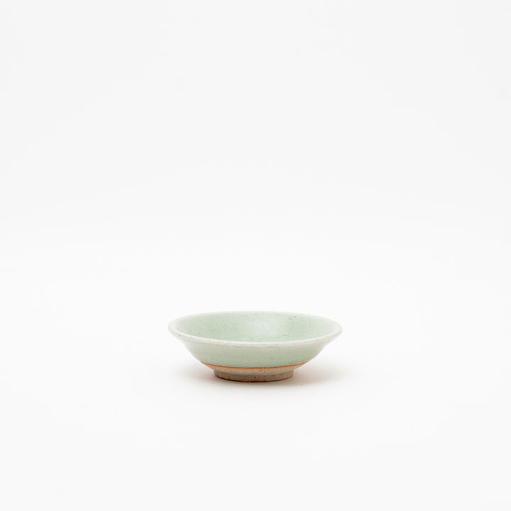 Side view of a small celadon bowl from Japan