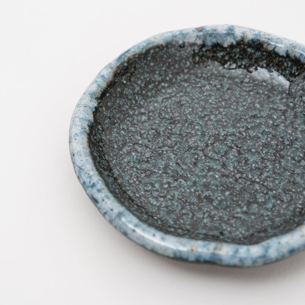 Handmade Japanese Karatsu dish with a speckled blue glaze