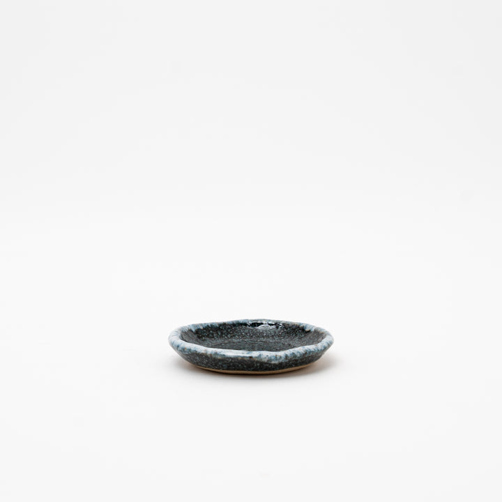 Small round Karatsu plate with a rustic rim